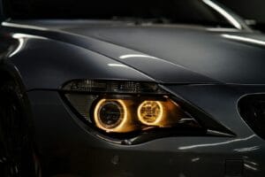 a close up of the headlights of a car